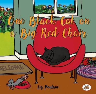 One Black Cat on a Big Red Chair