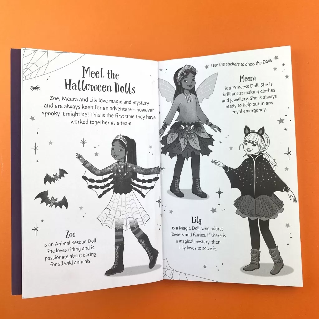 An interior spread from Sticker Dolly Stories: Creaky Castle: A Halloween Special, with the three main characters featured: Meera, Zoe and Lily.