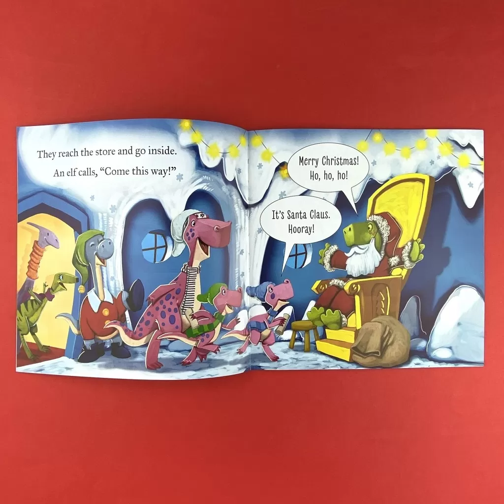 An interior spread of the book The Dinosaurs who Met Santa Claus where all the dinosaurs go meet Santa dinosaur sitting on his throne.